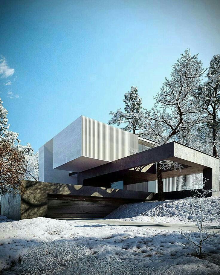 Экстерьер минималистичной загородной виллы на рельефе