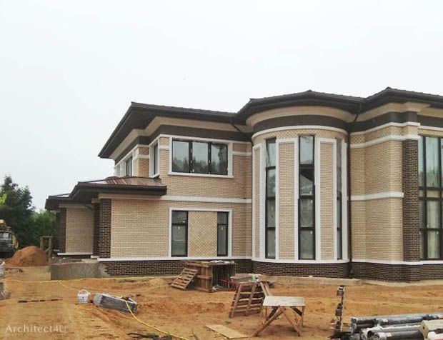 фото реализации фасадов дома в стиле Райта