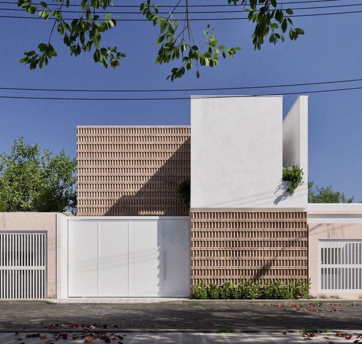 Новый хорошо забытый старый материал - перфорированные блоки в ограждении участка минималистичного ддвухэтажного дома